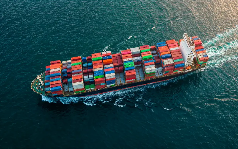Aerial view of a container ship transporting goods from China - sea freight logistics