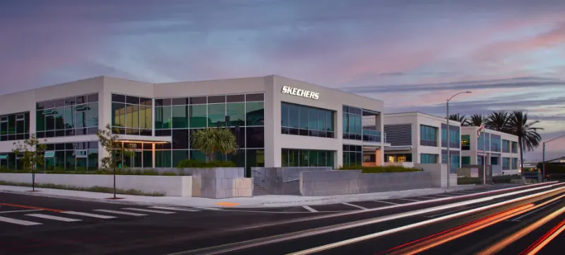 Skechers global headquarters building in Manhattan Beach, California at dusk