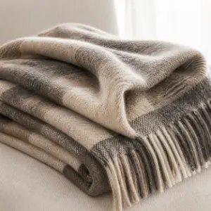 alpaca blanket material with brushed fibers and fringe