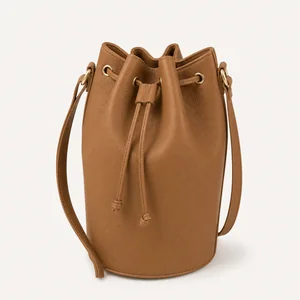 Bucket bag with round base and drawstring closure