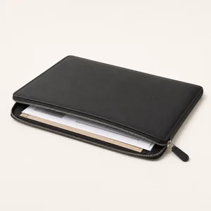Slim portfolio bag holding papers and documents