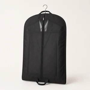 Garment bag carrying suits and formal clothing