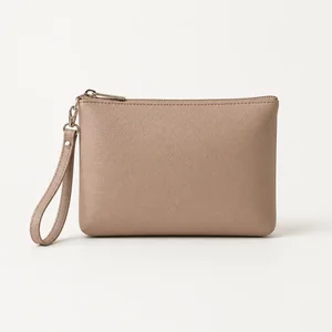 Small wristlet bag with loop strap for hand carry